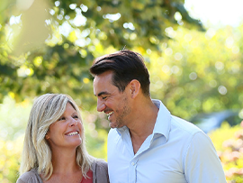 Happy Woman & Man in Park